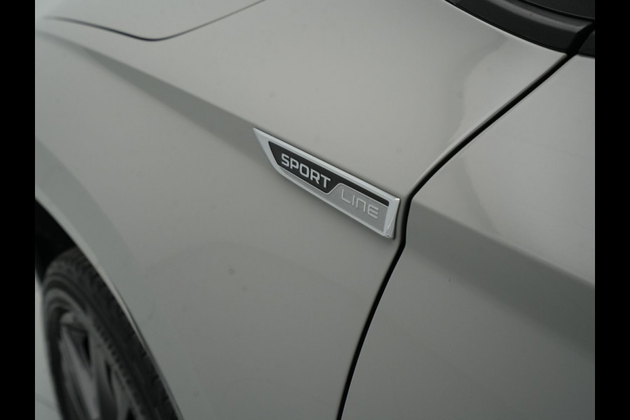 Škoda Karoq 1.5 TSI ACT 150pk DSG Sportline Business Navigatie CantonSound Stoelverwarming Camera Carplay Sideassist