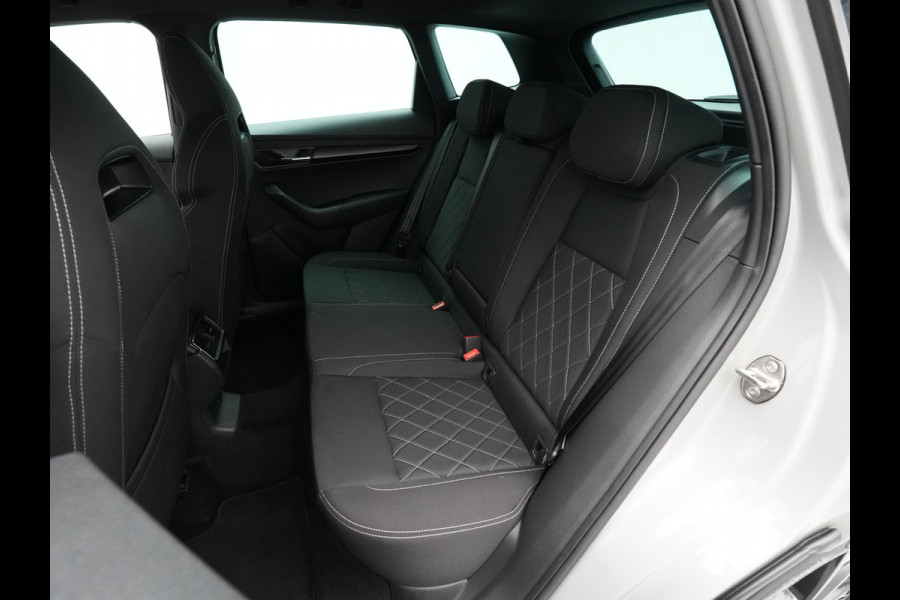 Škoda Karoq 1.5 TSI ACT 150pk DSG Sportline Business Navigatie CantonSound Stoelverwarming Camera Carplay Sideassist