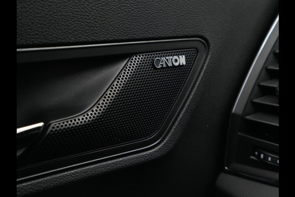 Škoda Karoq 1.5 TSI ACT 150pk DSG Sportline Business Navigatie CantonSound Stoelverwarming Camera Carplay Sideassist