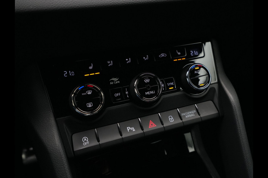 Škoda Karoq 1.5 TSI ACT 150pk DSG Sportline Business Navigatie CantonSound Stoelverwarming Camera Carplay Sideassist