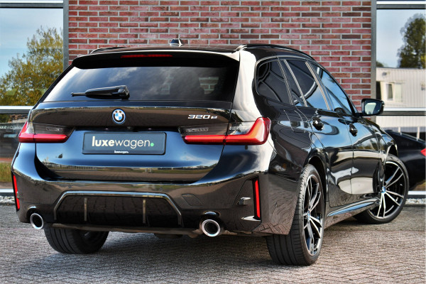 BMW 3 Serie Touring 320e M-Sport Pano El-zetels 360-cam HUD 19inch
