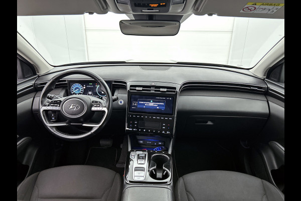 Hyundai Tucson 1.6 T-GDI HEV Comfort Automaat (TREKHAAK, NAVIGATIE, TREKHAAK, CARPLAY, STOELVERWARMING, CAMERA, 1e EIGENAAR)