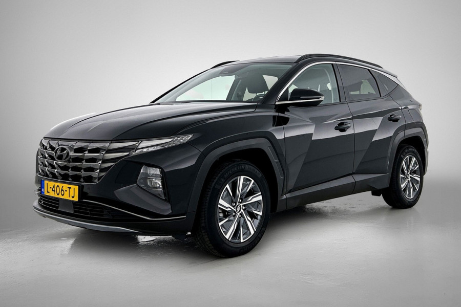 Hyundai Tucson 1.6 T-GDI HEV Comfort Automaat (TREKHAAK, NAVIGATIE, TREKHAAK, CARPLAY, STOELVERWARMING, CAMERA, 1e EIGENAAR)