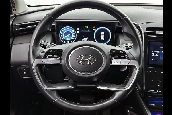 Hyundai Tucson 1.6 T-GDI HEV Comfort Automaat (TREKHAAK, NAVIGATIE, TREKHAAK, CARPLAY, STOELVERWARMING, CAMERA, 1e EIGENAAR)