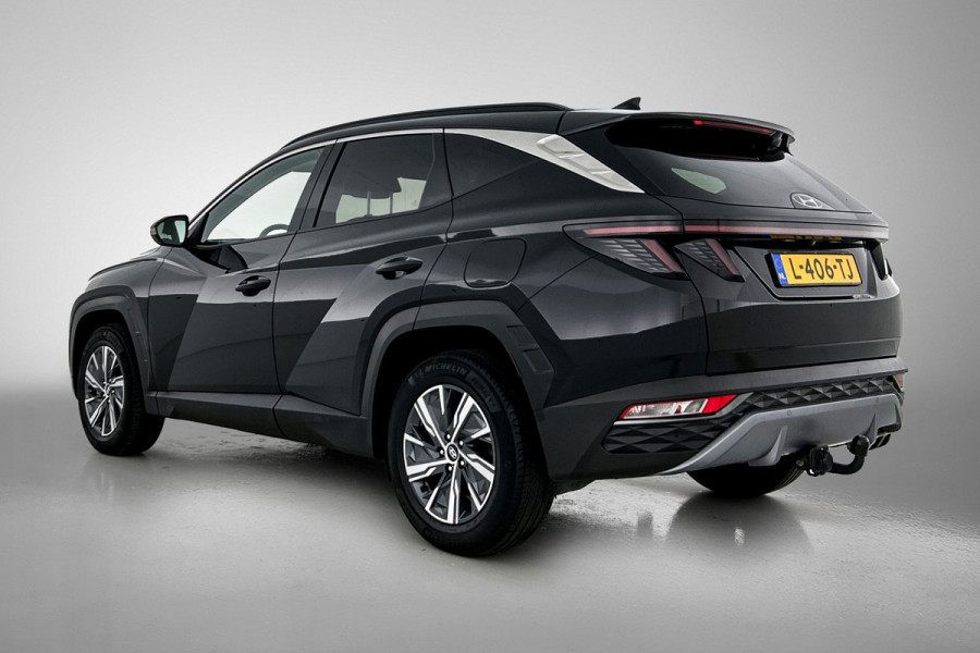 Hyundai Tucson 1.6 T-GDI HEV Comfort Automaat (TREKHAAK, NAVIGATIE, TREKHAAK, CARPLAY, STOELVERWARMING, CAMERA, 1e EIGENAAR)
