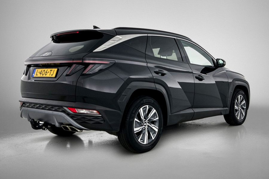 Hyundai Tucson 1.6 T-GDI HEV Comfort Automaat (TREKHAAK, NAVIGATIE, TREKHAAK, CARPLAY, STOELVERWARMING, CAMERA, 1e EIGENAAR)