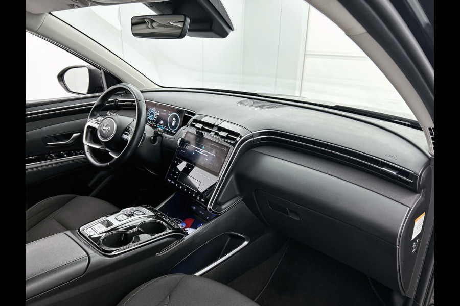 Hyundai Tucson 1.6 T-GDI HEV Comfort Automaat (TREKHAAK, NAVIGATIE, TREKHAAK, CARPLAY, STOELVERWARMING, CAMERA, 1e EIGENAAR)