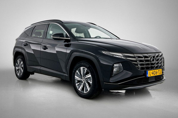 Hyundai Tucson 1.6 T-GDI HEV Comfort Automaat (TREKHAAK, NAVIGATIE, TREKHAAK, CARPLAY, STOELVERWARMING, CAMERA, 1e EIGENAAR)