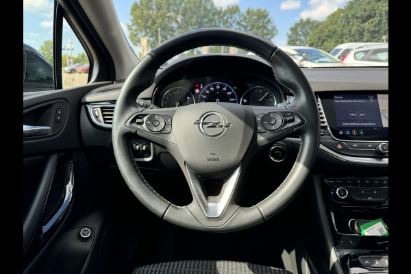 Opel Astra Sports Tourer 1.2 Blitz Elegance Schuif kanteldak Staat in Hardenberg