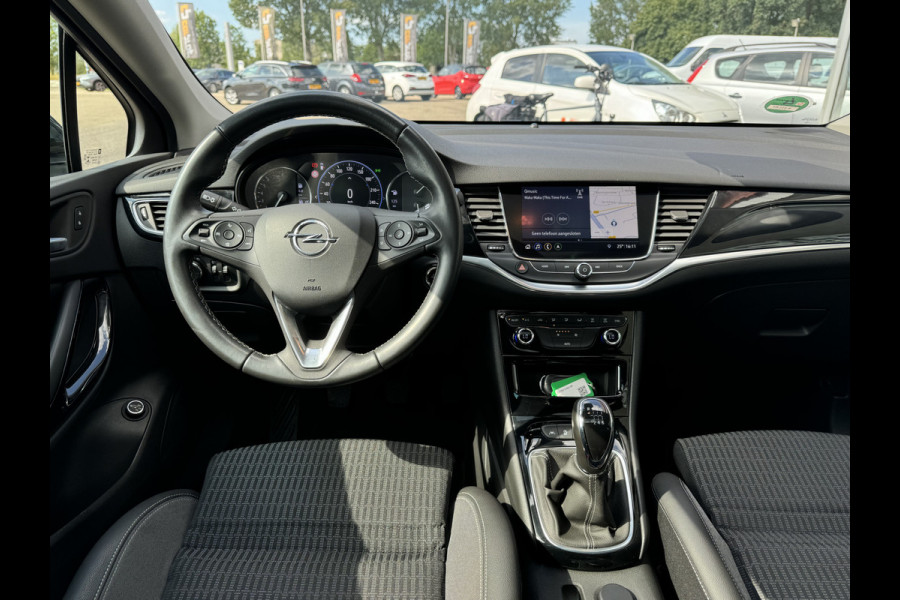 Opel Astra Sports Tourer 1.2 Blitz Elegance Schuif kanteldak Staat in Hardenberg