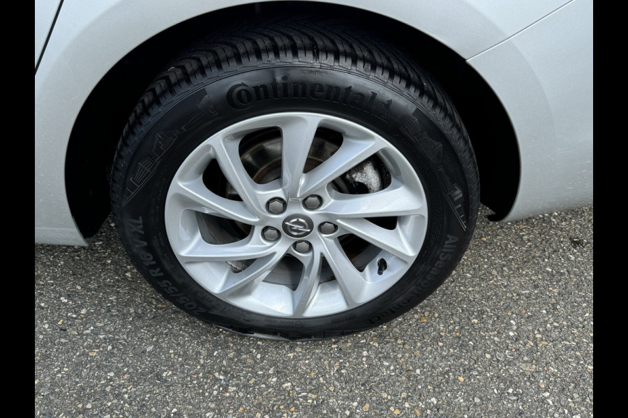 Opel Astra Sports Tourer 1.2 Blitz Elegance Schuif kanteldak Staat in Hardenberg