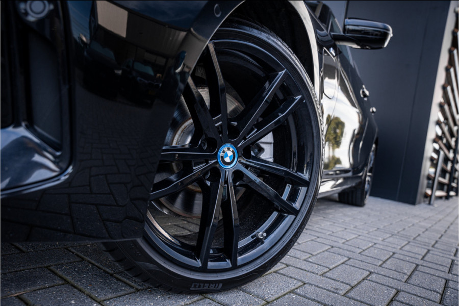 BMW 3 Serie Touring 320e - M Sport | Panorama | Cruise Control | Stoelverwarming