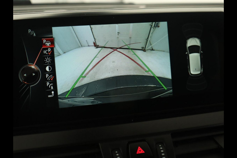 BMW 2 Serie Active Tourer 218i High Executive | Panoramadak | Luxury Line | Trekhaak | Leder | Stoelverwarming | Head-Up | Navigatie | Full LED | Sportstoelen | Camera | Parkeerhulp