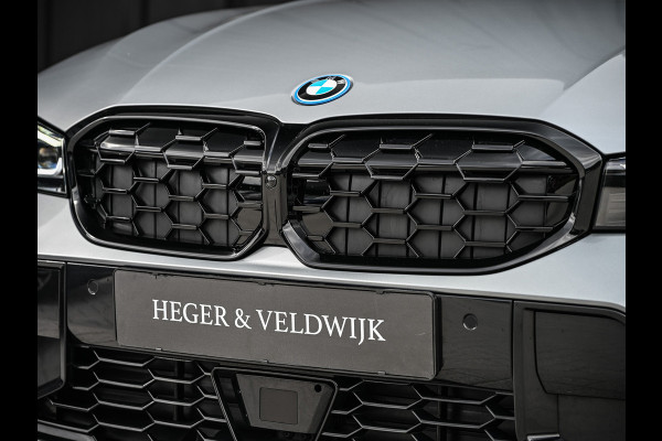 BMW 3 Serie Touring 330e xDrive M-SPORT | FACELIFT | ACCU 19,5 kWh | ACTIVE CRUISE | ELEKTR. TREKHAAK | HIFI AUDIO | SHADOW LINE | CAMERA |