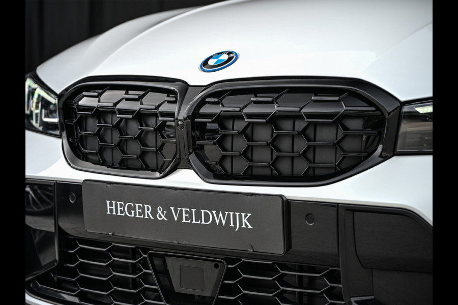 BMW 3 Serie Touring 330e xDrive M-SPORT | FACELIFT | ACCU 19,5 kWh | ACTIVE CRUISE | ELEKTR. TREKHAAK | HIFI AUDIO | SHADOW LINE | CAMERA |
