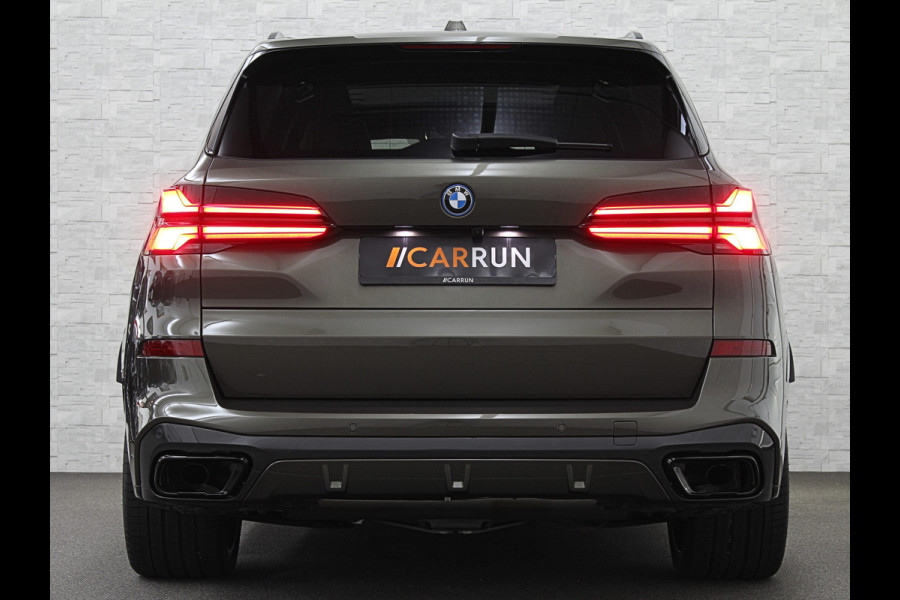 BMW X5 50e *7x Op Voorraad* M-Sport Pro | 360 Camera | ACC | Panorama | Massage | Individual Leder | Soft-Close | 4-Zone Clima | Head-U Manhattan Green | Harman-Kardon | Stoelventilatie | Trekhaak | Luchtvering | Stoelverwarming V+A | Keyless-Entry | Memory | Iconic-Glow | Comfortstoelen | Bekerhouders Gekoeld + Verwarmd | Zonwering | ISO-Glas |