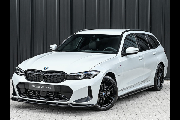 BMW 3 Serie Touring 330e xDrive M-SPORT | FACELIFT | ACCU 19,5 kWh | ACTIVE CRUISE | HIFI AUDIO | CAMERA | FULL-LED | STUUR- EN STOELVERWARM