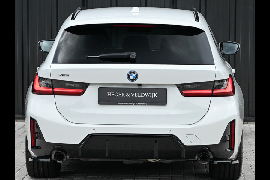 BMW 3 Serie Touring 330e xDrive M-SPORT | FACELIFT | ACCU 19,5 kWh | ACTIVE CRUISE | HIFI AUDIO | CAMERA | FULL-LED | STUUR- EN STOELVERWARM