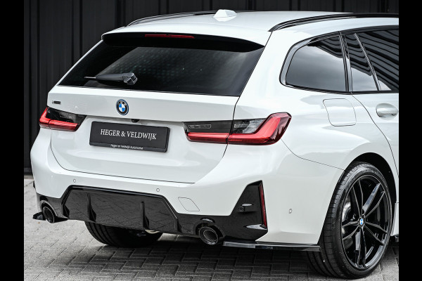 BMW 3 Serie Touring 330e xDrive M-SPORT | FACELIFT | ACCU 19,5 kWh | ACTIVE CRUISE | HIFI AUDIO | CAMERA | FULL-LED | STUUR- EN STOELVERWARM