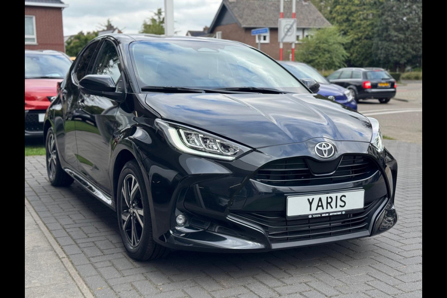 Toyota Yaris Hybrid Dynamic Plus | Stoel + Stuurverwarming, Lichtmetalen velgen, Keyless, Licht + Regensensor, Startknop Toyota Yaris Hybrid Dynamic Plus | Stoel + Stuurverwarming, Lichtmetalen velgen, Keyless, Licht + Regensensor, Startknop