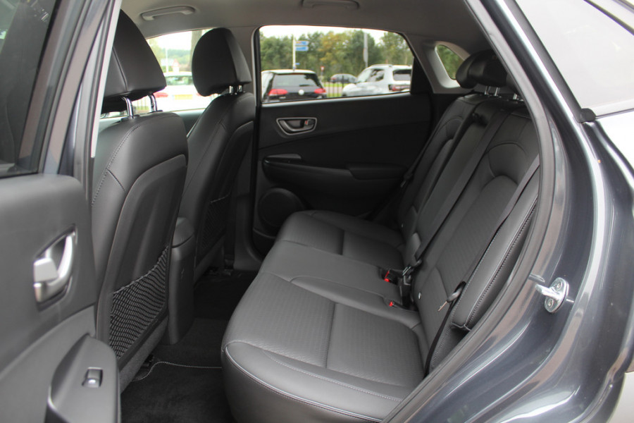 Hyundai Kona EV Premium 64 kWh / Leder / Headup display / Camera / Keyless / Navigatie / Stoel verwarming