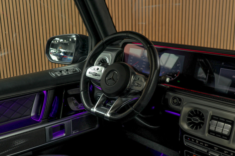 Mercedes-Benz G63 AMG Panodak Carbon Burmester Leer 360 PTS Open dak Navi Memory Stoelventilatie Stoelverwarming Climate NL auto