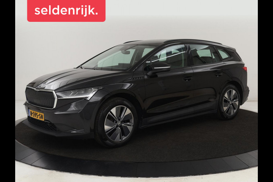 Škoda ENYAQ iV 60 | Stoelverwarming | Trekhaak | Matrix LED | Carplay | Stuurverwarming | Navigatie | Half leder | Cruise control | Parkeerhulp
