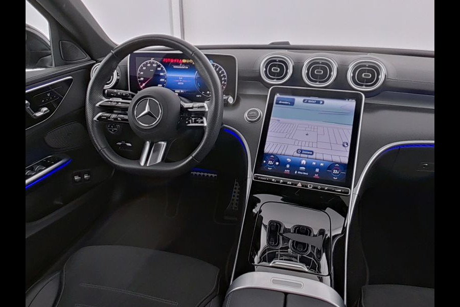 Mercedes-Benz C-Klasse Estate 300 e AMG Plug-In Hybride AMG Line | Night Pakket | Trekhaak | Panorama Schuif-Kanteldak | Memory Voorstoelen. Inclusief 24 maanden Mercedes-Benz Certified garantie voor Europa. Mercedes-Benz C-Klasse Estate 300 e AMG Plug-In Hybride AMG Line | Night Pakket | Trekhaak | Panorama Schuif-Kanteldak | Memory Voorstoelen. Inclusief 24 maanden Mercedes-Benz Certified garantie voor Europa.