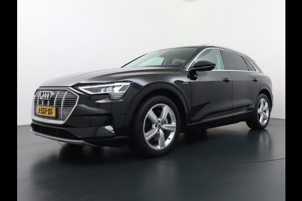 Audi e-tron 55 Quattro 95kWh 408PK Trekhaak Leder/Alcantara Panoramadak Adap.Cruise Navi Ecc Stoelverwarming Business Edition Plus Luchtvering Memory Lmv Elek.Achterklep Privacy Glas Keyless 1e Eigenaar 1.800KG Trekgewicht Zeer compleet!