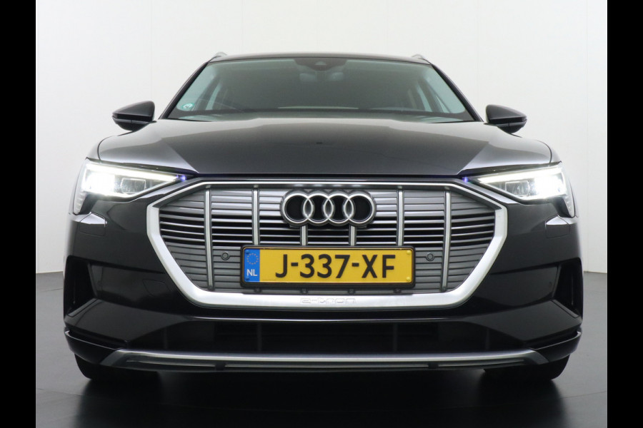Audi e-tron 55 Quattro 95kWh 408PK Trekhaak Leder/Alcantara Panoramadak Adap.Cruise Navi Ecc Stoelverwarming Business Edition Plus Luchtvering Memory Lmv Elek.Achterklep Privacy Glas Keyless 1e Eigenaar 1.800KG Trekgewicht Zeer compleet!
