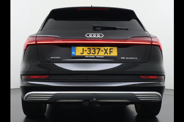Audi e-tron 55 Quattro 95kWh 408PK Trekhaak Leder/Alcantara Panoramadak Adap.Cruise Navi Ecc Stoelverwarming Business Edition Plus Luchtvering Memory Lmv Elek.Achterklep Privacy Glas Keyless 1e Eigenaar 1.800KG Trekgewicht Zeer compleet!