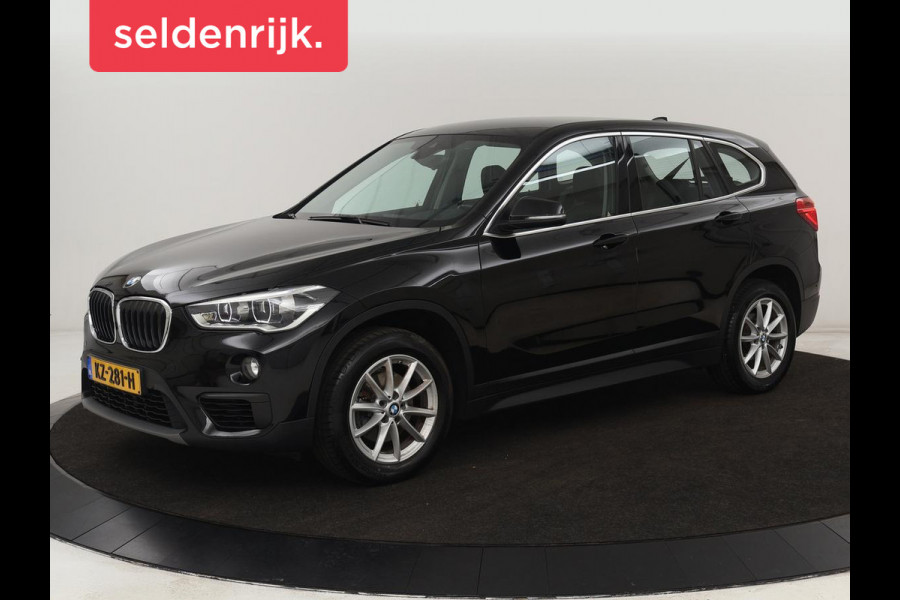 BMW X1 sDrive18i High Executive | Leder | Trekhaak | Harman/Kardon | Stoelverwarming | Head-Up | Full LED | Navigatie | Parkeerhulp | Climate control | Bluetooth