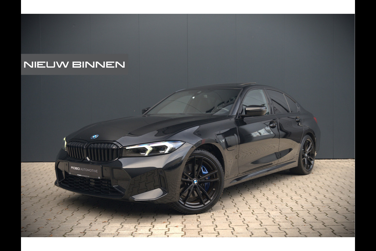 BMW 3-serie 320e High Executive M Sport | Panoramadak | Harman Kardon | Carbon | Camera | Adaptive LED | Stoelverwarming | Stuurverwarming | Apple Carplay | Navigatie | Cruise Control | Memory Seat | Trekhaak | Keyless | Shadowline BMW 3-serie 320e High Executive M Sport | Panoramadak | Harman Kardon | Carbon | Camera | Adaptive LED | Stoelverwarming | Stuurverwarming | Apple Carplay | Navigatie | Cruise Control | Memory Seat | Trekhaak | Keyless | Shadowline