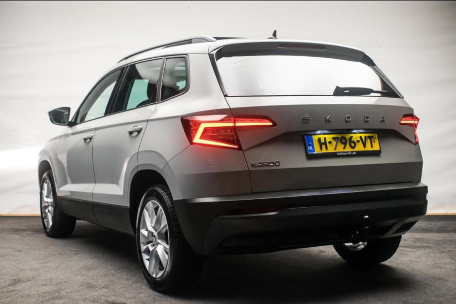Škoda Karoq 1.0 TSI Ambition Sport [ Panoramadak El Trekhaak Camera Sportinterieur Stoelverwarming Carplay ]