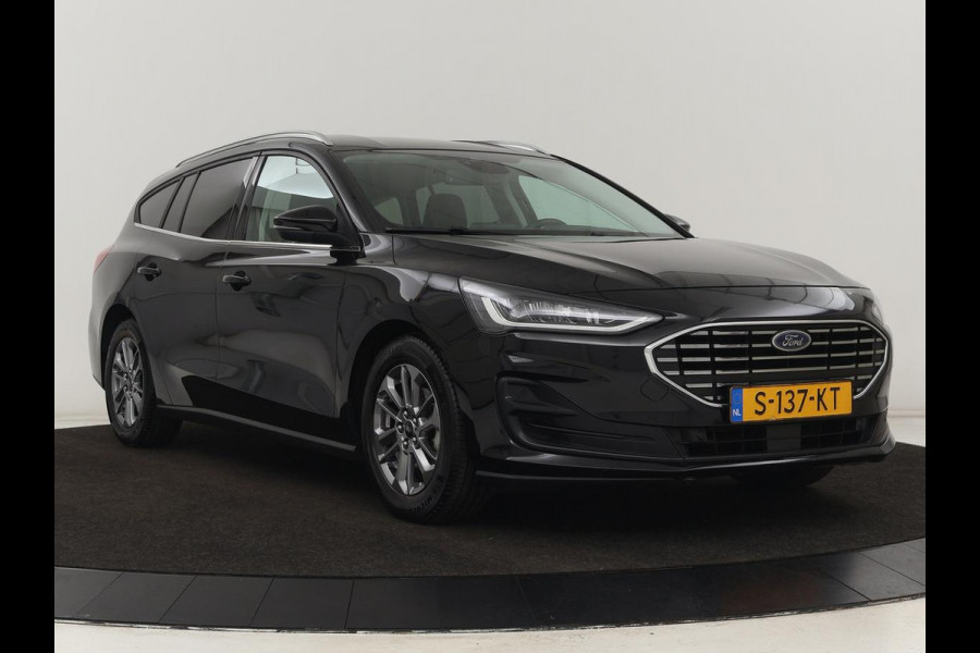 Ford Focus 1.0 EcoBoost Hybrid Titanium | Automaat | Carplay | Keyless | Navigatie | Climate control | Full LED | Parkeerhulp | Cruise control | DAB Ford Focus 1.0 EcoBoost Hybrid Titanium | Automaat | Carplay | Keyless | Navigatie | Climate control | Full LED | Parkeerhulp | Cruise control | DAB