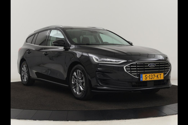 Ford Focus 1.0 EcoBoost Hybrid Titanium | Automaat | Carplay | Keyless | Navigatie | Climate control | Full LED | Parkeerhulp | Cruise control | DAB Ford Focus 1.0 EcoBoost Hybrid Titanium | Automaat | Carplay | Keyless | Navigatie | Climate control | Full LED | Parkeerhulp | Cruise control | DAB