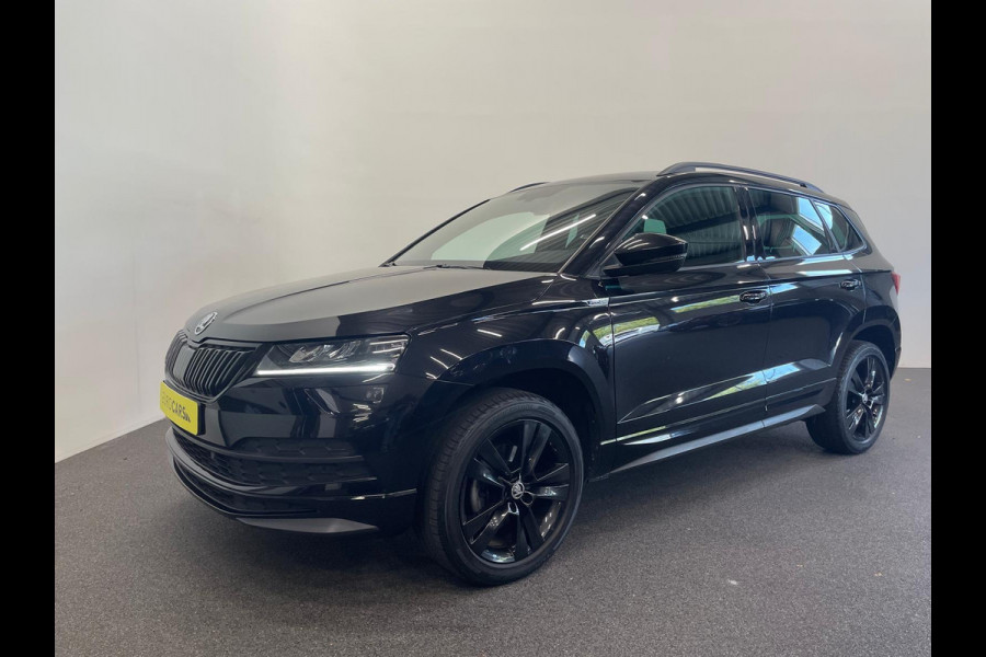 Škoda Karoq 1.5 TSI DSG Sportline Navigatie Apple Carplay/Android Auto Camera Parkeersensoren Cruise Control Elektrische achterklep Stoelverwarming Virtual Cockpit Climate Control Lichtmetalen velgen