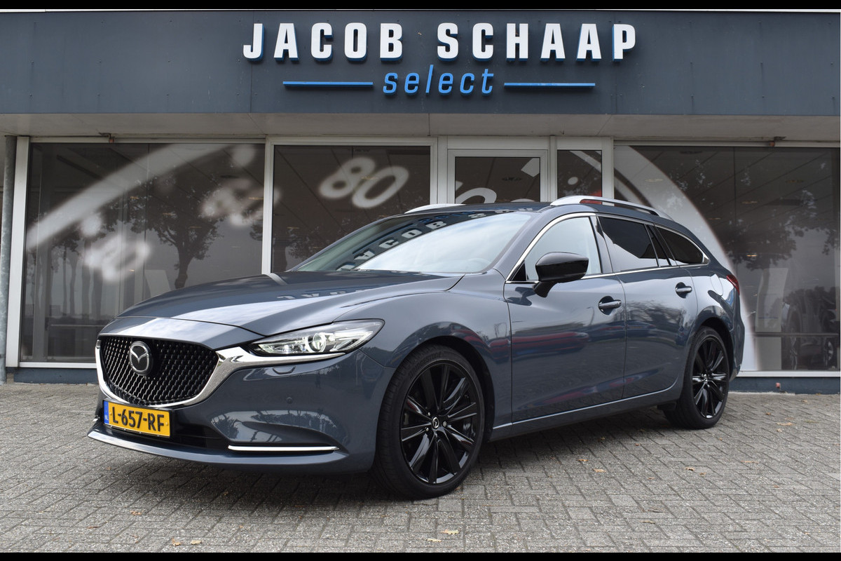 Mazda 6 Sportbreak 2.0 SA G 165 Luxury Automaat  / Navi / Adap. Cruise / 19" LM / Carplay / Cameras / Keyless / Stoelverw. + ventilatie Mazda 6 Sportbreak 2.0 SA G 165 Luxury Automaat  / Navi / Adap. Cruise / 19" LM / Carplay / Cameras / Keyless / Stoelverw. + ventilatie