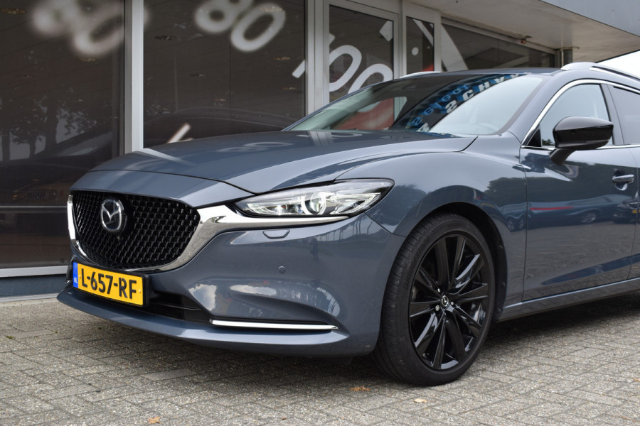 Mazda 6 Sportbreak 2.0 SA G 165 Luxury Automaat  / Navi / Adap. Cruise / 19" LM / Carplay / Cameras / Keyless / Stoelverw. + ventilatie Mazda 6 Sportbreak 2.0 SA G 165 Luxury Automaat  / Navi / Adap. Cruise / 19" LM / Carplay / Cameras / Keyless / Stoelverw. + ventilatie