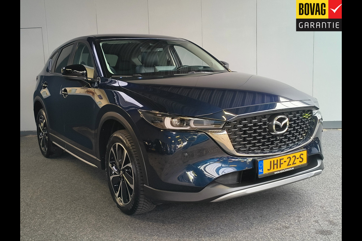 Mazda CX-5 2.0 e-SkyActiv-G M Hybrid 165 Newground AUTOMAAT uit 2023 Rijklaar + 12 maanden Bovag-garantie Henk Jongen Auto's in Helmond, al 50 jaar service zoals 't hoort! Mazda CX-5 2.0 e-SkyActiv-G M Hybrid 165 Newground AUTOMAAT uit 2023 Rijklaar + 12 maanden Bovag-garantie Henk Jongen Auto's in Helmond, al 50 jaar service zoals 't hoort!