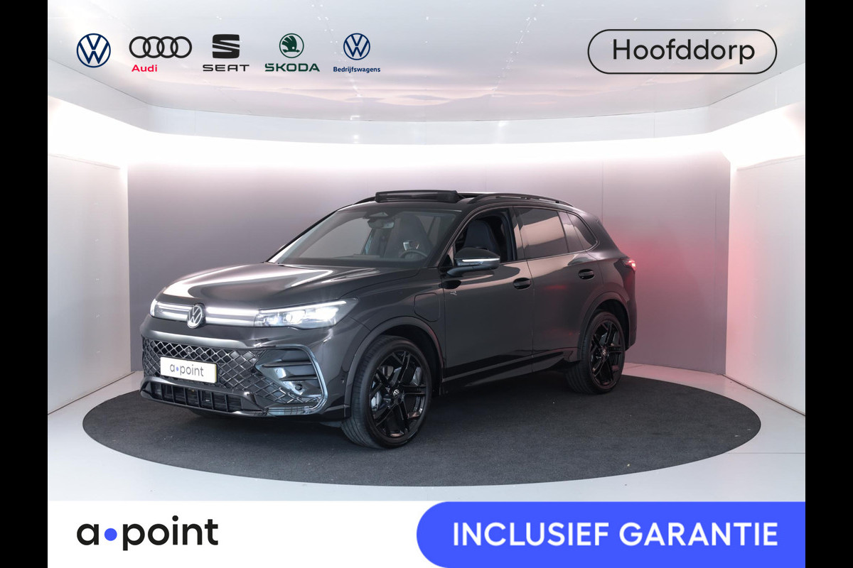 Volkswagen Tiguan 1.5 eHybrid R-Line Edition 272 PK PHEV | Verlengde garantie | Panorama dak | Trekhaak | Black Style | Matrix koplampen |  Assistance pakket plus | Volkswagen Tiguan 1.5 eHybrid R-Line Edition 272 PK PHEV | Verlengde garantie | Panorama dak | Trekhaak | Black Style | Matrix koplampen |  Assistance pakket plus |