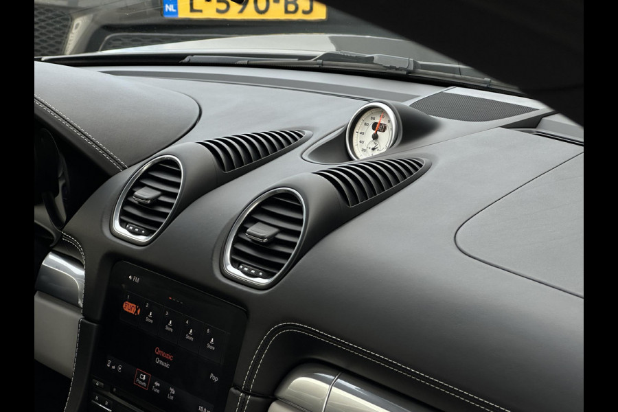 Porsche 718 Cayman 2.0 Sportchrono Adapt. Cruise BOSE Stuurverw. CarPlay Keyless LED 20”LM Agaatgrijs Porsche 718 Cayman 2.0 Sportchrono Adapt. Cruise BOSE Stuurverw. CarPlay Keyless LED 20”LM Agaatgrijs