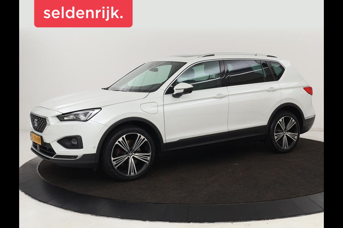 Seat Tarraco 1.4 TSI e-Hybrid PHEV Xcellence | Panoramadak | Leder | Trekhaak | Stoel & achterbankverwarming | Adaptive cruise | Carplay | Camera | Digital Cockpit | Navigatie | Plug In Seat Tarraco 1.4 TSI e-Hybrid PHEV Xcellence | Panoramadak | Leder | Trekhaak | Stoel & achterbankverwarming | Adaptive cruise | Carplay | Camera | Digital Cockpit | Navigatie | Plug In