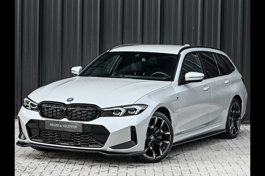 BMW 3 Serie Touring 330e xDrive M-SPORT | FACELIFT | ACCU 19,5 kWh | ACTIVE CRUISE | ELEKTR. TREKHAAK | HIFI AUDIO | SHADOW LINE | CAMERA |
