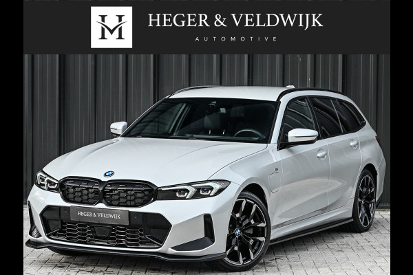 BMW 3 Serie Touring 330e xDrive M-SPORT | FACELIFT | ACCU 19,5 kWh | ACTIVE CRUISE | ELEKTR. TREKHAAK | HIFI AUDIO | SHADOW LINE | CAMERA |
