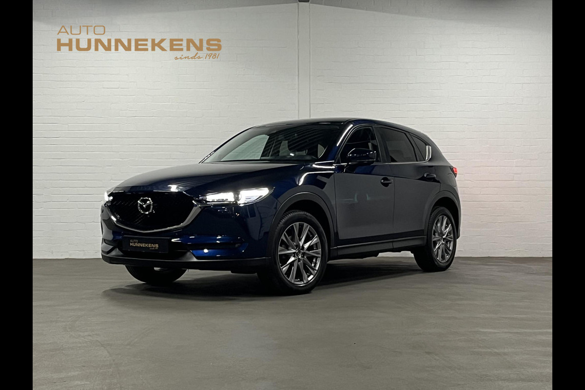 Mazda CX-5 2.0 SkyActiv-G Sport Selected Trekhaak | Head-up Display | Cruise control | Stoel-/Stuurverwarming | 360 graden camera Mazda CX-5 2.0 SkyActiv-G Sport Selected Trekhaak | Head-up Display | Cruise control | Stoel-/Stuurverwarming | 360 graden camera
