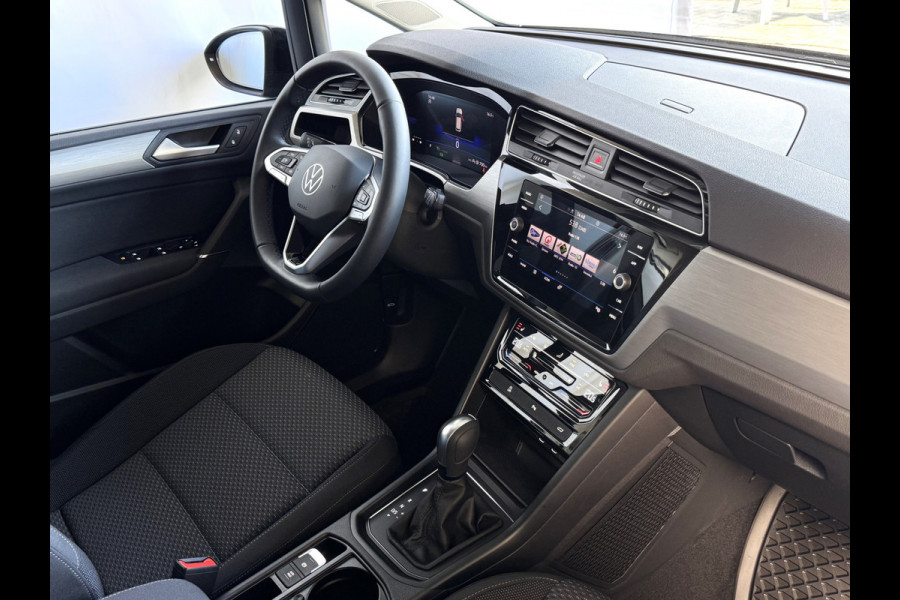 Volkswagen Touran 1.5 TSI 150PK 7P CARPLAY NAVI CAMERA LED ELEK.KLEP VIR.COCKPIT DODE.HOEK DET. STOELVERW KEYLESS 7P 7PERS 10/2024 "Volkswagen rijden begint bij Topautos.nl – 75 topmodellen direct op voorraad!"