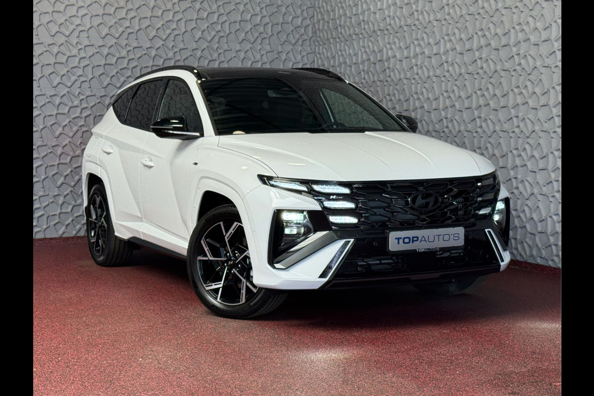 Hyundai Tucson NIEUWE AUTO 1.6 T-GDI PHEV 252PK 4WD N-LINE SKY PANO. 360.CAMERA SMART.PARK ELEK.KLEP ELEK.STOEL/GEHEUG.VERWARMD SUBWFR 19''LMV PLUG IN HYBRIDE - 5 JAAR GARANTIE Hyundai Tucson NIEUWE AUTO 1.6 T-GDI PHEV 252PK 4WD N-LINE SKY PANO. 360.CAMERA SMART.PARK ELEK.KLEP ELEK.STOEL/GEHEUG.VERWARMD SUBWFR 19''LMV PLUG IN HYBRIDE - 5 JAAR GARANTIE