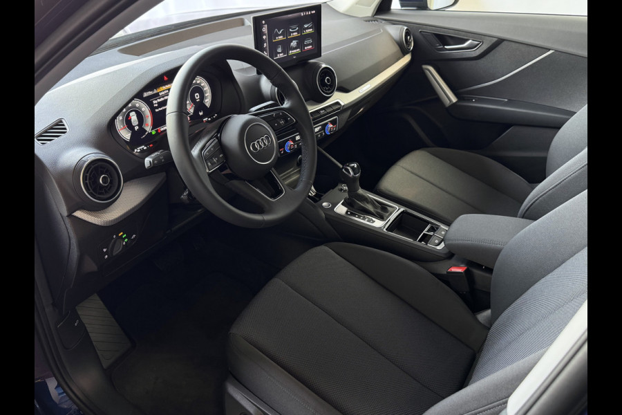 Audi Q2 35 TFSI 1.5 S EDITION NAVARRA BLAUW ELEK.KLEP 150PK VIR.COCKPIT 18''LMV TOUCHSCREEN CARPLAY NAVI CAMERA LED STOELVERW. PDC 03/2025 "Audi rijden begint bij Topautos.nl – 20 Audi topmodellen direct op voorraad!"