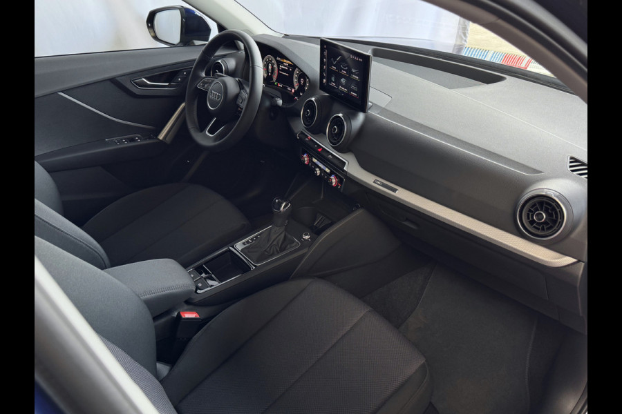 Audi Q2 35 TFSI 1.5 S EDITION NAVARRA BLAUW ELEK.KLEP 150PK VIR.COCKPIT 18''LMV TOUCHSCREEN CARPLAY NAVI CAMERA LED STOELVERW. PDC 03/2025 "Audi rijden begint bij Topautos.nl – 20 Audi topmodellen direct op voorraad!"